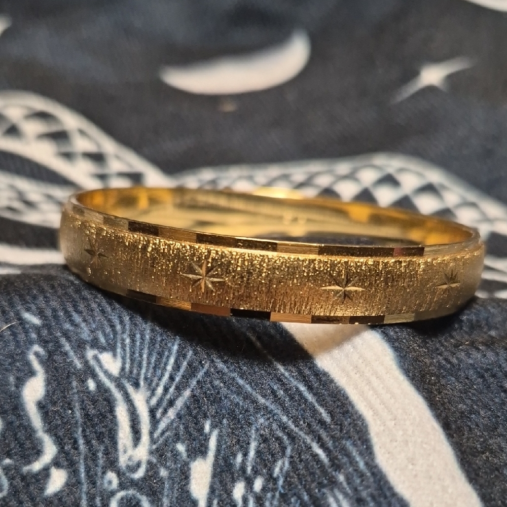 Gold Tone  Starburst  Patterned Bangle Bracelet By Monet